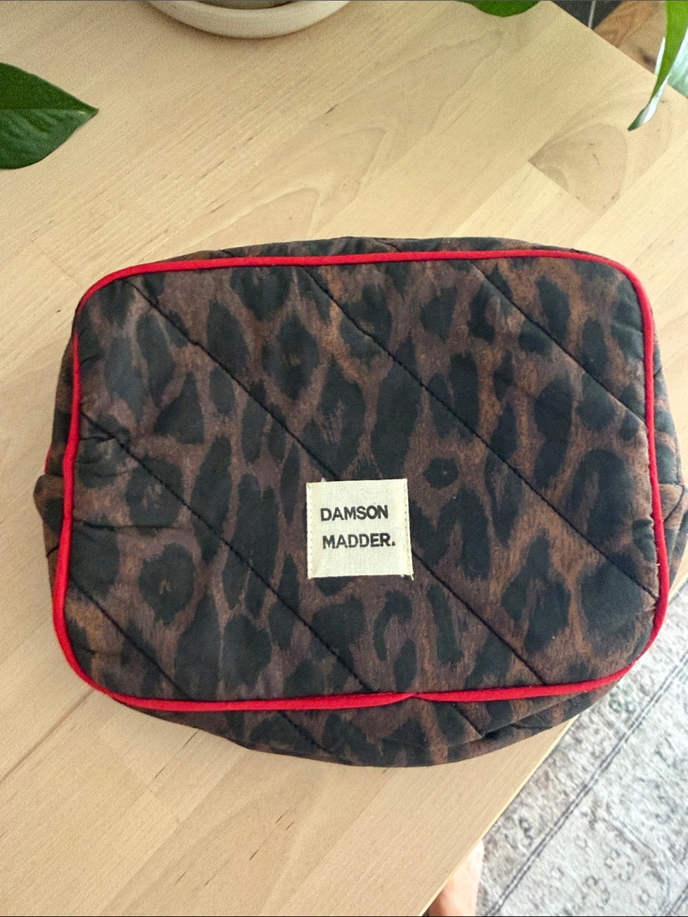 Damson Madder Leopard Quilted Toiletry Bag in Brown with Red Trim